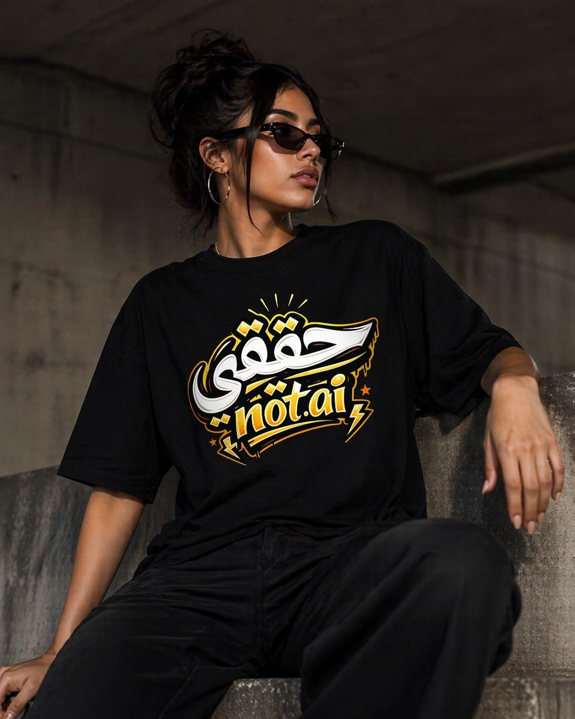 Real Not AI Arabic typography streetwear black cotton t-shirt with bold white graphic print.
