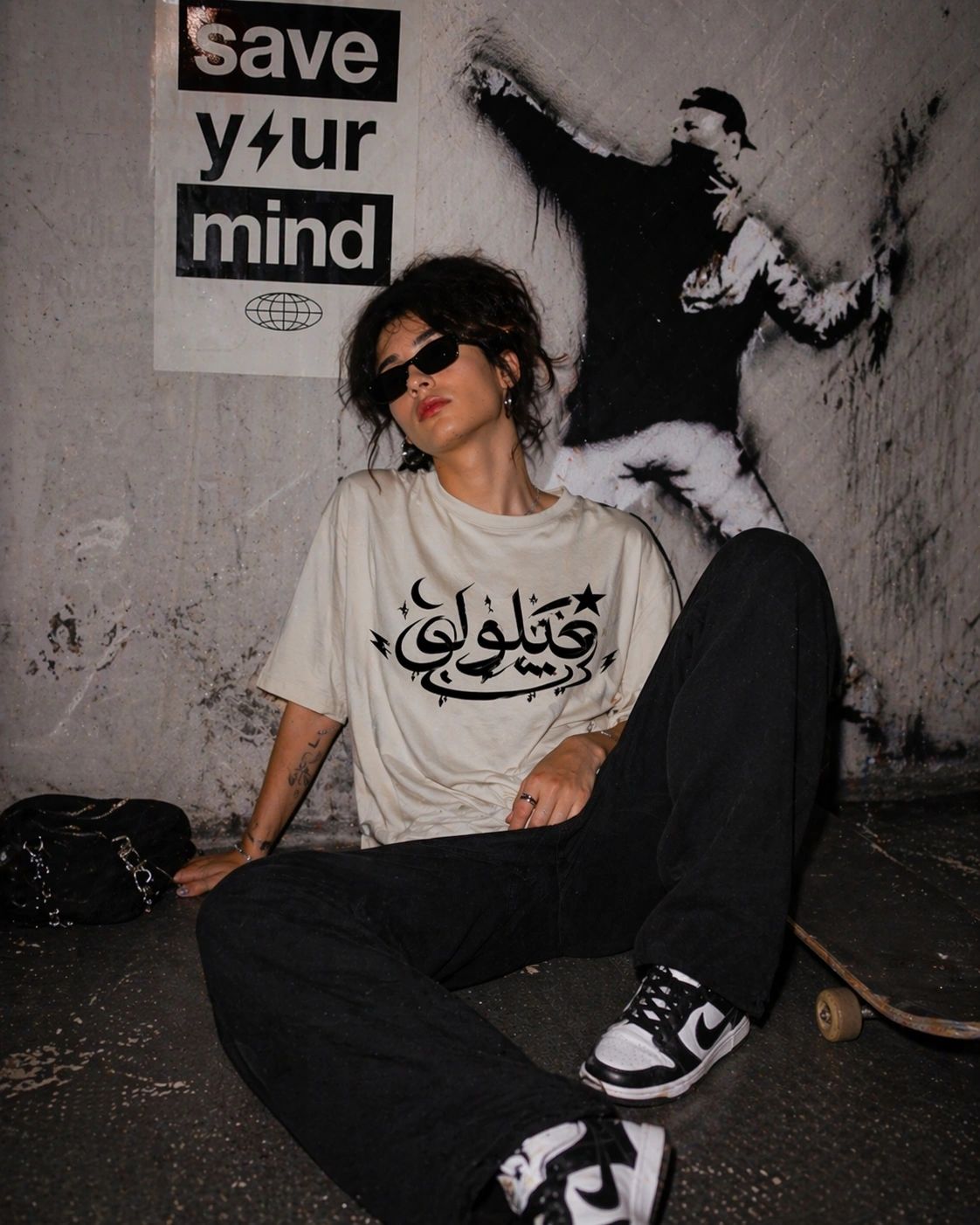 Delulu Retro Arabic Graphic Tee from the Forever Collection featuring vintage-inspired typography.