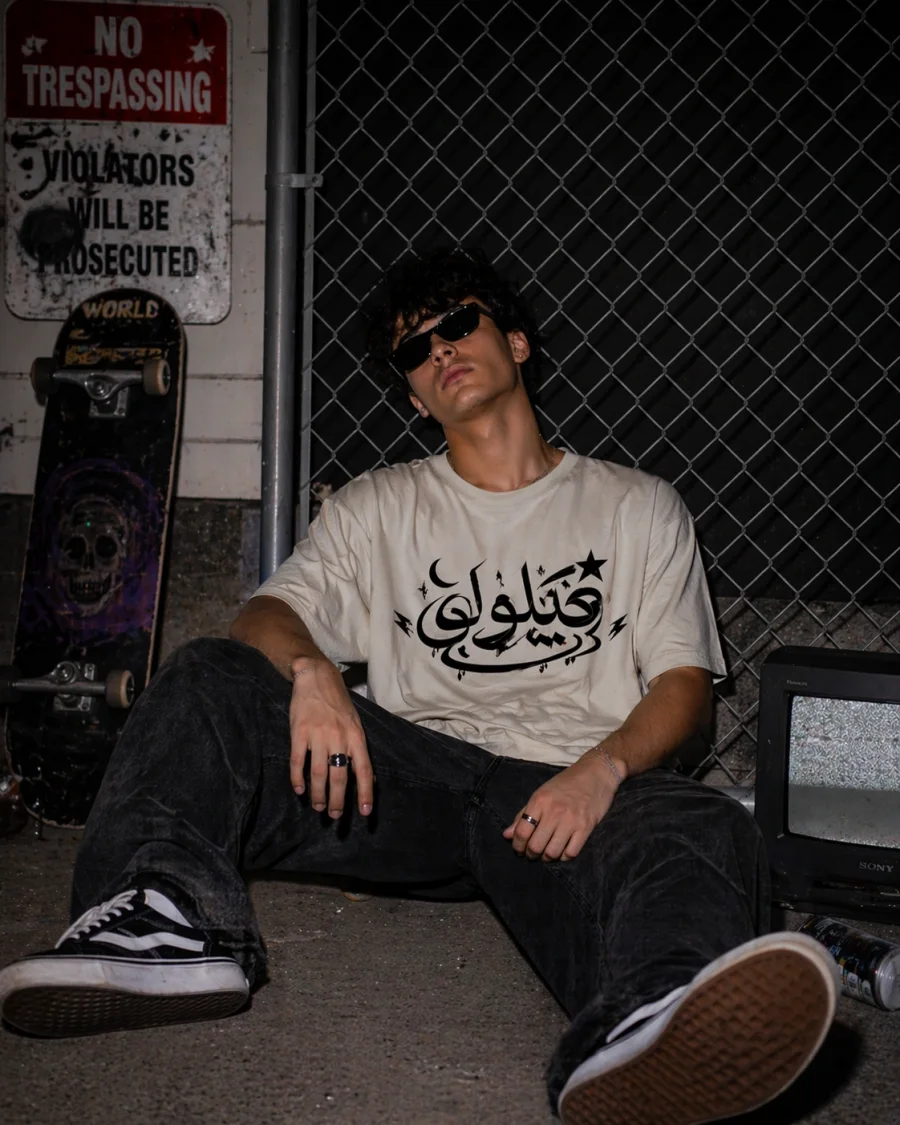 Delulu Retro Arabic Graphic Tee from the Forever Collection, a vintage-style streetwear t-shirt.