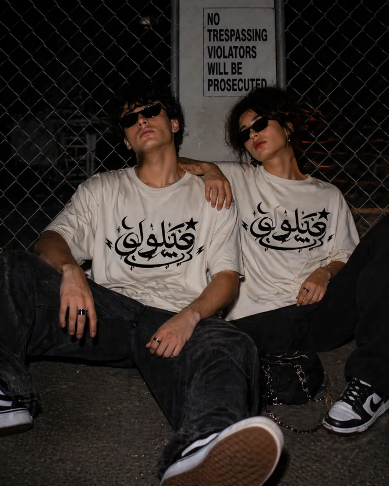 Delulu Retro Arabic Graphic Tee from the Forever Collection featuring vintage-inspired typography.