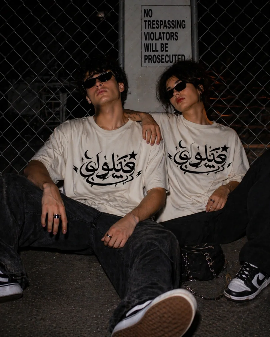 Delulu Retro Arabic Graphic Tee from the Forever Collection featuring vintage-inspired typography.