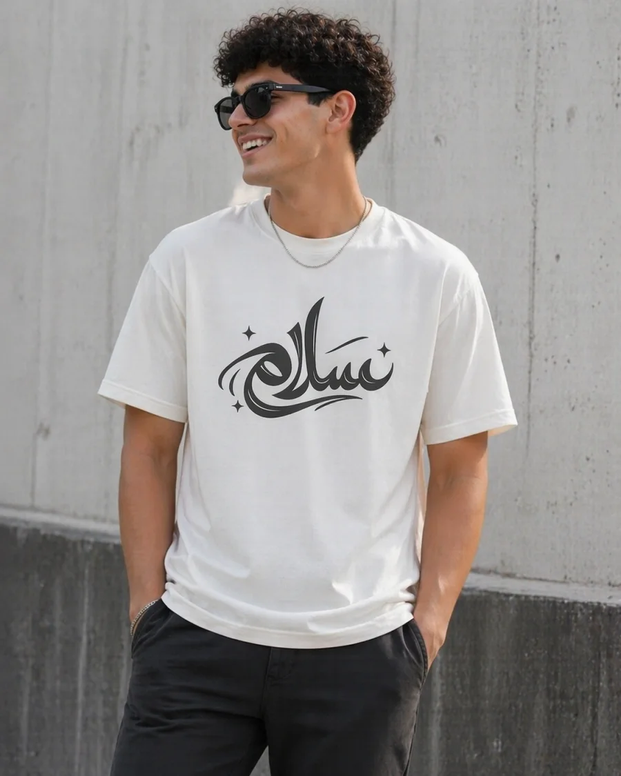 Retro streetwear staple Salam Arabic graphic tee featuring peace calligraphy design.